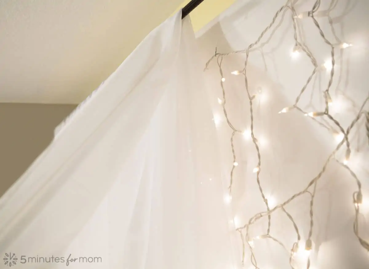 easy sheer fabric photo backdrop with mini lights