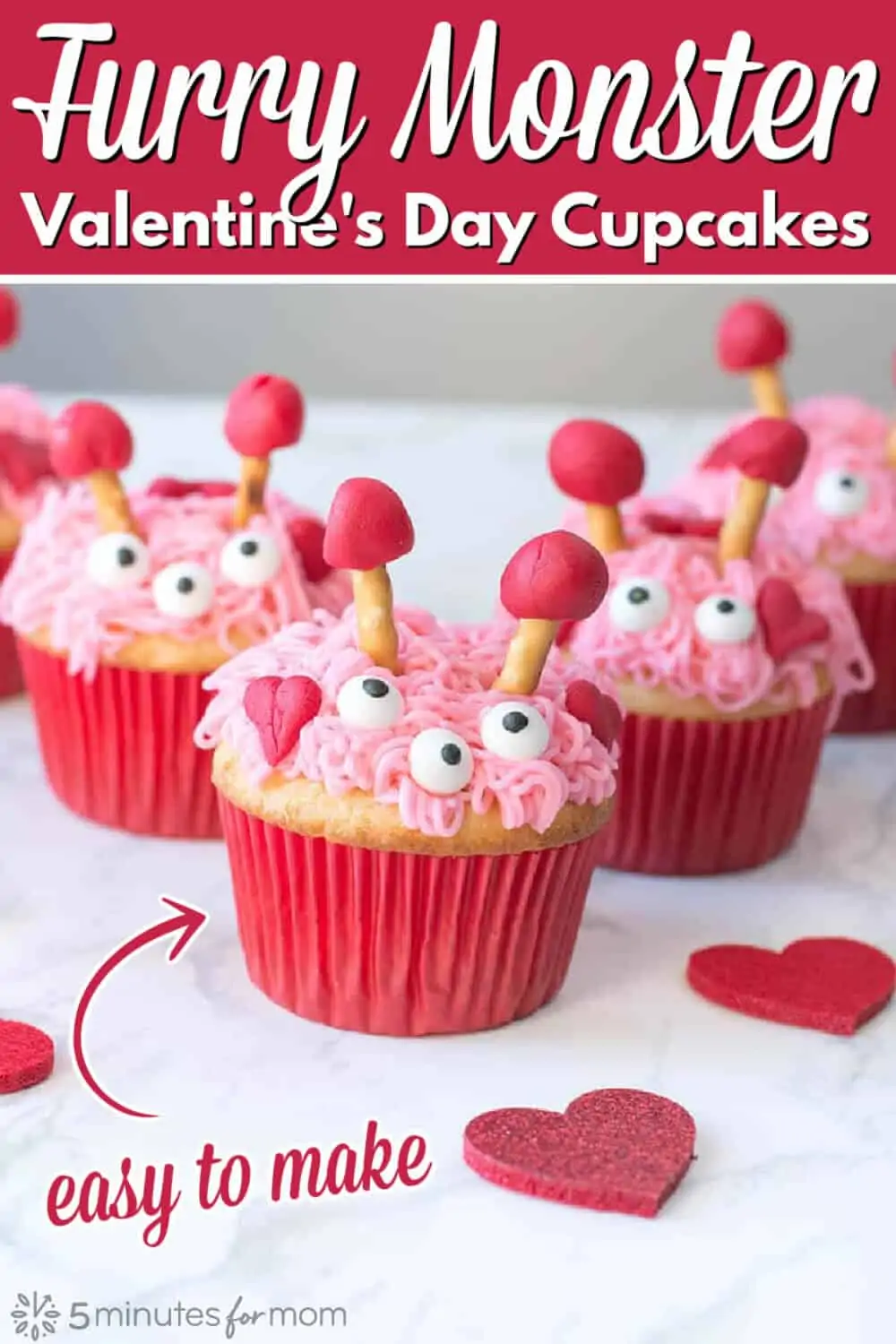 Vanilla cupcakes decorated with pink and red icing, pretzels, and candy eyes. Text says Furry Monster Valentine's Day Cupcakes - Easy to Make.