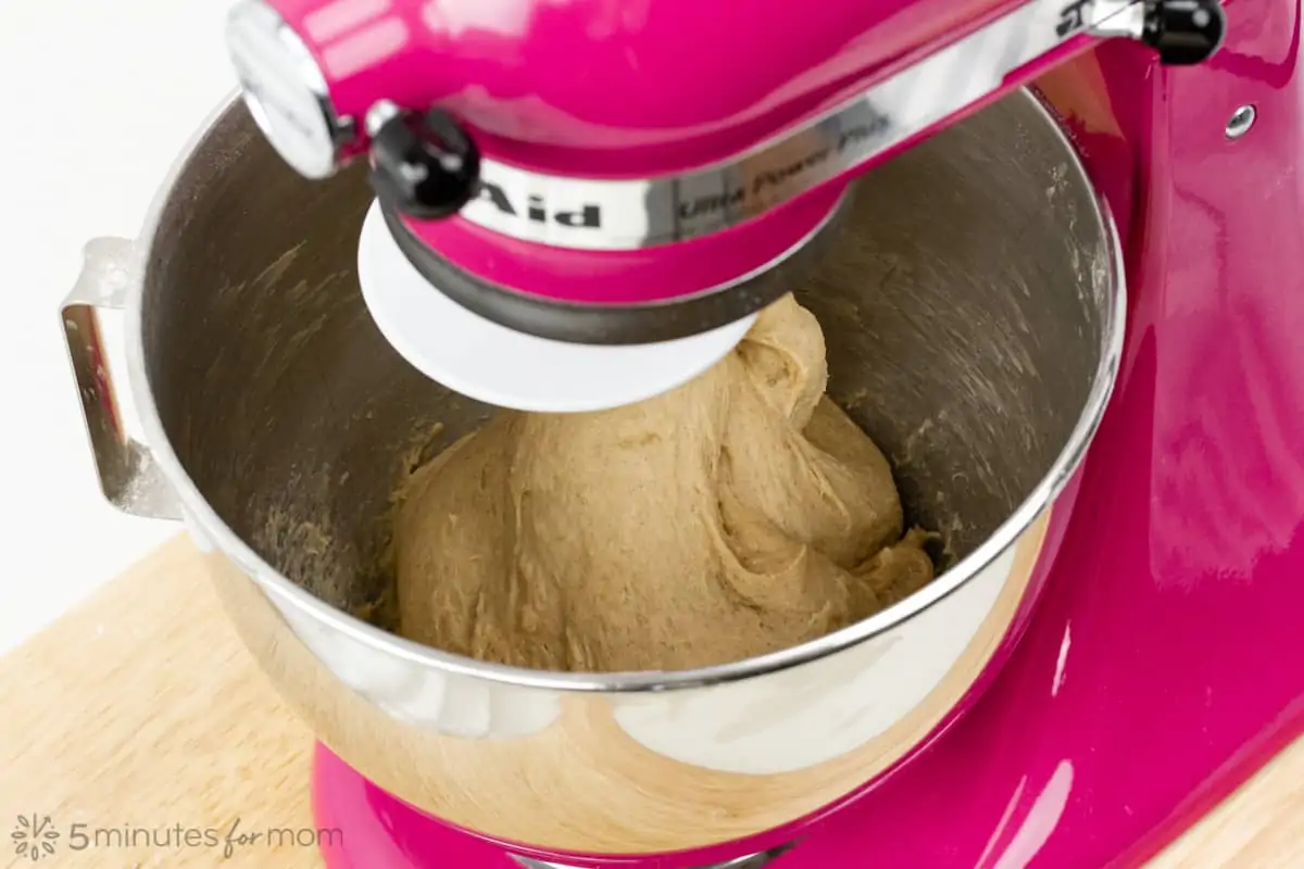 the dough pulls away from the sides of the mixing bowl when it is kneaded well