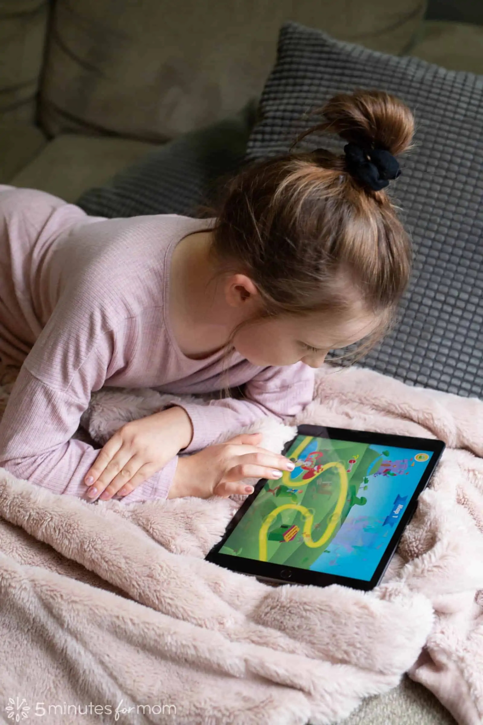 Young girl using an educational app