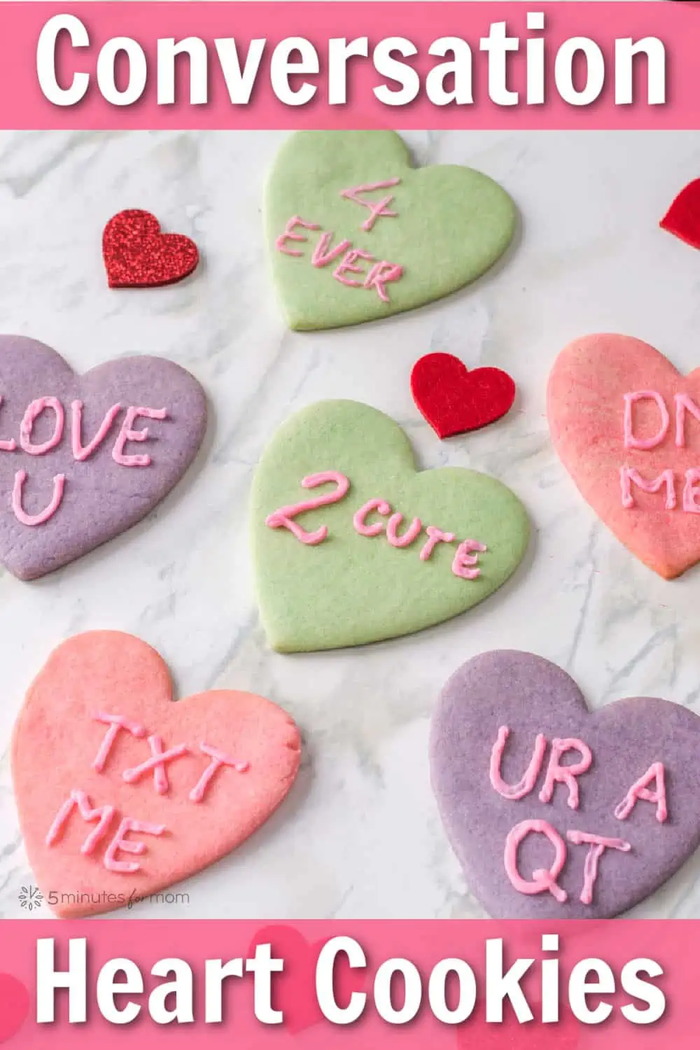 Pink purple and green colored sugar cookies - Text overlay says Conversation Heart Cookies