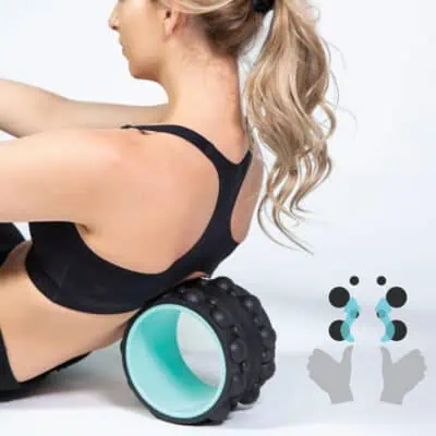 Women demonstrating how to use a 6 inch massage wheel as a gift idea for women